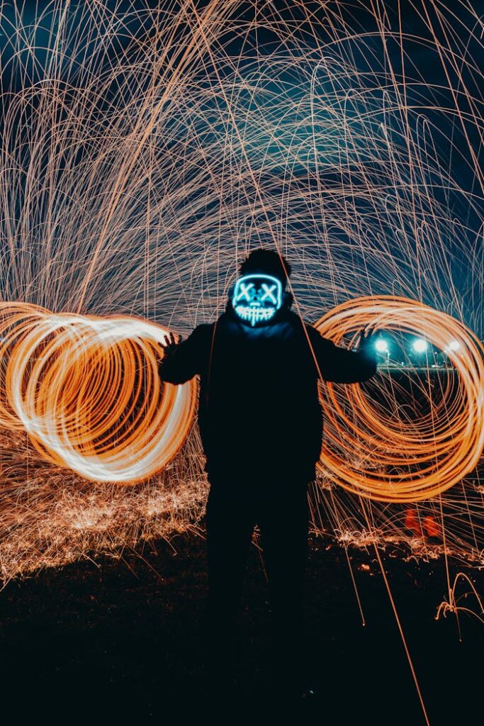 Silhouette of man with bright sparks